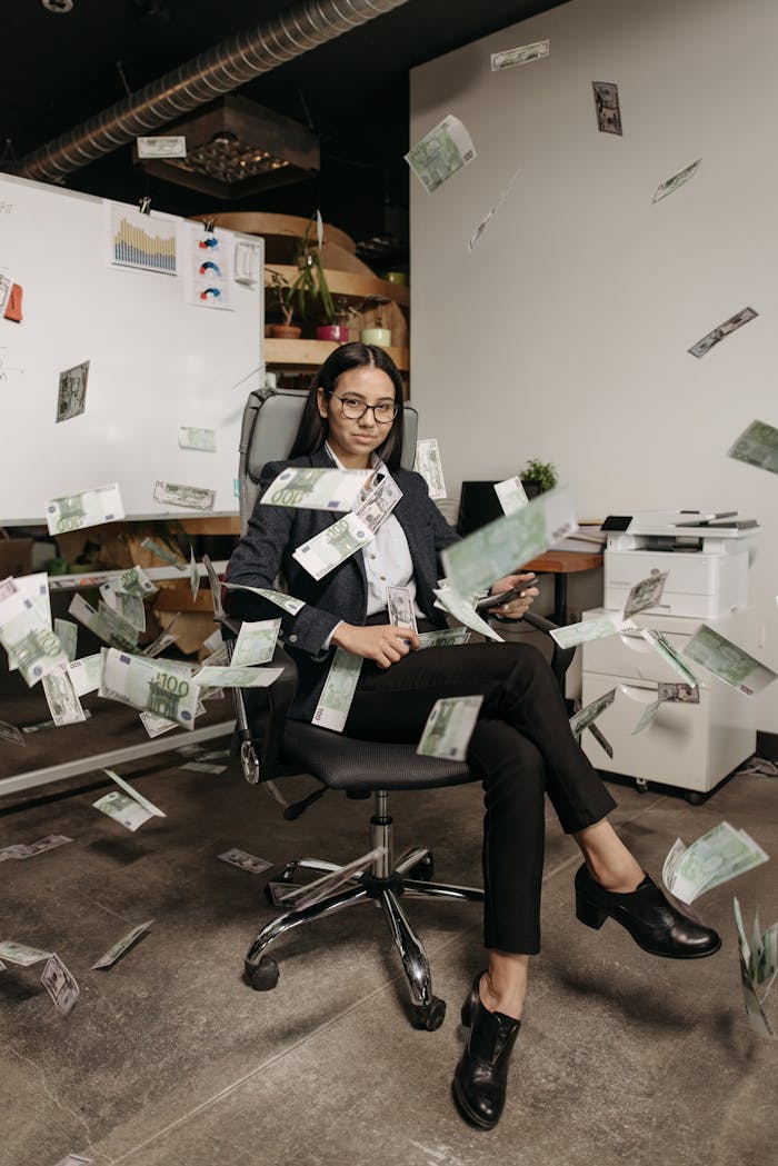 digital Businesswoman in modern office with falling cash, symbolizing financial success.